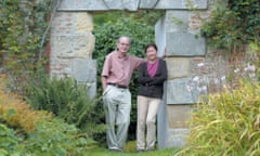 Chris Mullin with his wife Ngoc in a garden