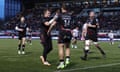 Saracens’ Alex Lewington is congratulated by teammate Nick Tompkins