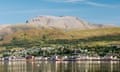 Ben Nevis, highest mountain in UK, rises above Fort William at the head of Loch Linnhe. Western Highlands, Scotland. Summer. UK