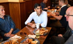 Rishi Sunak (centre) meeting veterans at a community breakfast in his constituency in Northallerton, North Yorkshire, while on the General Election campaign trail.