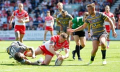 Joe Batchelor of St Helens picks up the loose ball from Gareth O'Brien of Castleford and goes over to score their third try.