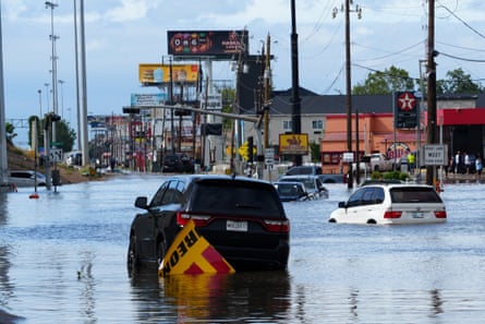 Cars submerged in floodwater