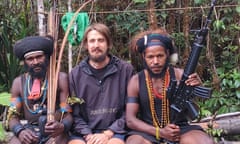 New Zealand pilot Phillip Mehrtens with two West Papua National Liberation Front members.