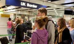 Young people waiting to enter the UK Border at immigration, Terminal 3, Heathrow airport