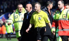Jonathan Moss is escorted off the pitch after the 2-2 draw between Leicester City and West Ham.