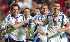 Georgios Karagounis (left) and Theodoros Zagorakis with the European Championship trophy after they beat Portugal in the 2004 final.