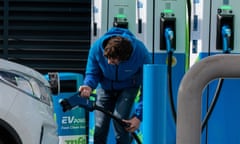 UK Fuel Crisis Spurs Inquiries About Electric Cars, Say Dealers<br>LONDON, ENGLAND - SEPTEMBER 29: A motorist plugs his electric van to charge point at a Motor Fuel Group station whilst petrol and diesel pumps are closed on the Esso forecourt due to the ongoing fuel crisis on September 29, 2021 in London, England. Electric vehicle dealers in England reported a spike in inquiries over the weekend as the UK struggled with a retail petrol shortage, due to delivery disruptions and resultant "panic buying." (Photo by Chris J Ratcliffe/Getty Images)