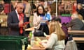 Labour and Conservative party members observe  as ballots are counted