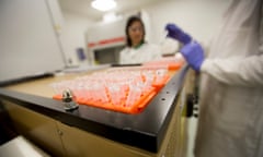 lab workers testing biological samples