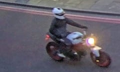 Fuzzy CCTV image of motorcyclist