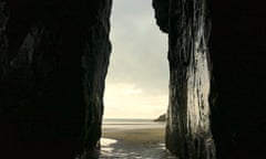 Sea cave on Black Rock Sands, north Wales, UK.