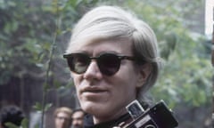 Andy Warhol, with camera