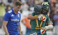 AB de Villiers hugs his team-mate David Wiese