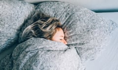 High Angle View Vie Of Woman Sleeping On Bed<br>GettyImages-611475641