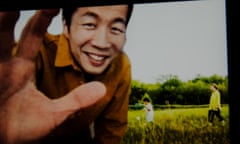 Lee Isaac Chung photographed in front of a screening of his film Minari.