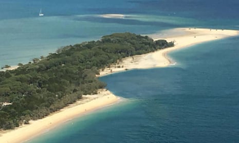 Sinkhole opens up on Queensland beach  – video