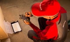 Rentokil worker in a red cap