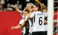 Germany celebrate an Alexandra Popp goal.