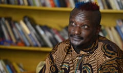 FILES-KENYA-GAY-RIGHTS-LITERATURE<br>(FILES) In this file photo taken on January 27, 2014 Kenyan author Binyavanga Wainaina looks on during an interview with the AFP, in Nairobi. - Internationally-renowned Kenyan writer Binyavanga Wainaina, whose high-profile coming out in a country that criminalises homosexuality made him an icon for gay rights across Africa, has died aged 48, his publishing house said on May 22, 2019. He died just days before Kenya’s High Court was expected to deliver a long-awaited ruling on whether to abolish colonial-era anti-gay laws. (Photo by Simon MAINA / AFP)SIMON MAINA/AFP/Getty Images