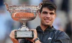 Carlos Alcaraz with the French Open men’s trophy after his victory over Alexander Zverev at Roland Garros, where he will return for the Olympics