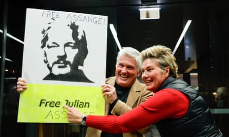 Supporters of WikiLeaks founder Julian Assange wait outside a hotel in Canberra where the Assange family is expected to appear.