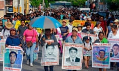 Relatives of the 43 missing students march the day after of the fifth anniversary of their disappearance, in Iguala, 27 September 2019. 