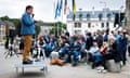 Graham Linehan performing outside the Scottish parliament.