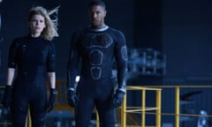 This photo provided by Twentieth Century Fox shows, Kate Mara, left, as Sue Storm, and Michael B. Jordan as Johnny Storm, in a scene from the film, "Fantastic Four." The movie releases in U.S. theaters on Friday, Aug. 7, 2015. (Ben Rothstein/Twentieth Century Fox via AP)