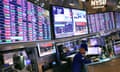 Traders work on the floor of the New York stock exchange.