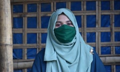 Head and shoulders photograph of Yasmin Ara wearing hijab and face mask