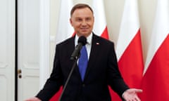 The Polish president, Andrzej Duda, speaks to the media after initial poll results indicated he had been re-elected in a run-off vote