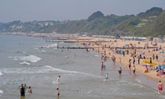 A wide view of the beach and sea