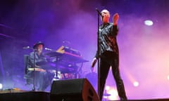 Peter Garrett performs during Midnight Oil’s concert at the Domain in Sydney. Former PM Paul Keating has criticised the band over the concerts.