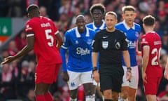 Liverpool's Ibrahima Konate (left) argues with referee Craig Pawson during the Premier League match against Everton.