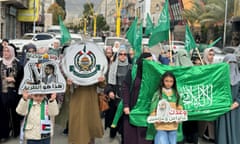 Palestinians take part in a protest in Hebron, in the West Bank, a day after the 2 January killing of the senior Hamas official Saleh al-Arouri in Beirut.