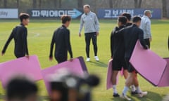 Jürgen Klinsmann watches South Korea train.