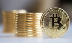 Bitcoins As The Digital Currency Climbed To Highest Levels Since Early November<br>A single Bitcoin stands in front of a collection of Bitcoins in this arranged photograph in Danbury, U.K., on Thursday, Dec. 10, 2015. Bitcoin, the digital currency, climbed on Wednesday to hit its highest levels since early November, amid fresh speculation that the identity of Satoshi Nakamoto -- the virtual currency’s creator -- may have finally been revealed. Photographer: Chris Ratcliffe/Bloomberg via Getty Images