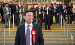 Former Labour Cabinet minister Andy Burnham smiles as he celebrates with his family and supporters after being elected as Mayor of Greater Manchester