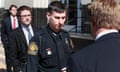 Officer Stephen D. Rankin leaves the U.S. District Court building in Norfolk, Virginia with his attorneys, Tuesday, February 28th, 2012. (Brian J. Clark/The Virginian-Pilot) William Chapman