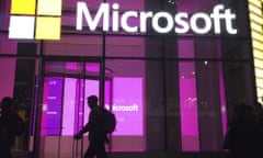 FILE - In this Nov. 10, 2016, file photo, people walk near a Microsoft office in New York. Consumer advocates and the data-hungry technology industry are drawing early battle lines in 2019 in advance of an expected fight over a national privacy law. A think tank backed by Google, Amazon, Microsoft and other major tech companies proposed changes that would still give the industry broad authority to collect and use customer data. (AP Photo/Swayne B. Hall, File)