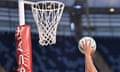 Cropped photo of hands shooting the ball towards the net