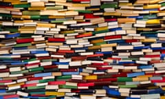 Huge stack of books - Book wall<br>A lot of books stacked and forming a wall.