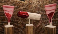 Models of a pair of menstrual cups and a tampon at the Vagina Museum