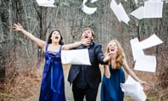 Neave Trio throwing paper into the air