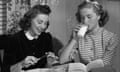 Two young women at a table