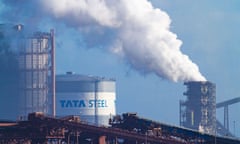 Blast furnaces spewing out smoke, with a Tata Steel sign visible.