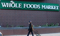 US-HEALTH-VIRUS-FOOD-ELDERLY<br>A woman walks into a Whole Foods supermarket during hours reserved for customers 60 years and older to minimize contact with others as people social distance due to the outbreak of the coronavirus, at a store location in Washington, DC, March 20, 2020. - Whole Foods, like several other retailers, is reserving some hours for customers 60 years and older to minimize contact with others as people social distance due to the outbreak of the coronavirus. (Photo by SAUL LOEB / AFP) (Photo by SAUL LOEB/AFP via Getty Images)