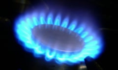 Blue gas flame of a gas cooker
against dark background