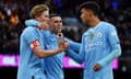 Manchester City's Kevin De Bruyne (left) with Phil Foden during the game against Huddersfield.