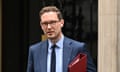 Darren Jones, the chief secretary to the Treasury, leaves Downing Street carrying a red file under his arm